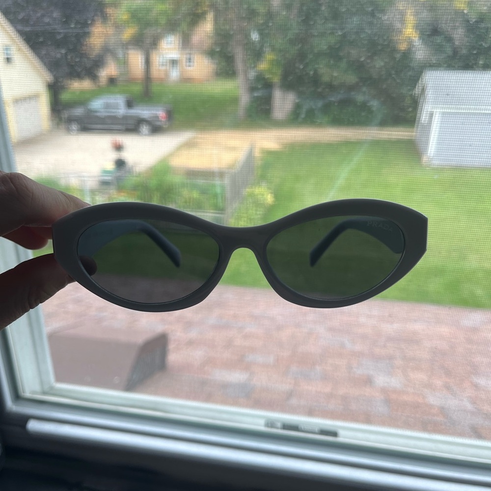 White women's prada sunglasses oval